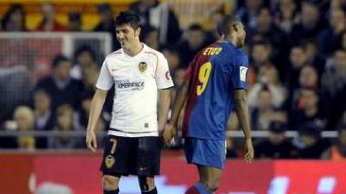 David Villa, a la izquierda, junto al camerunés del Barça, Samuel Eto-™o, los dos máximos goleadores