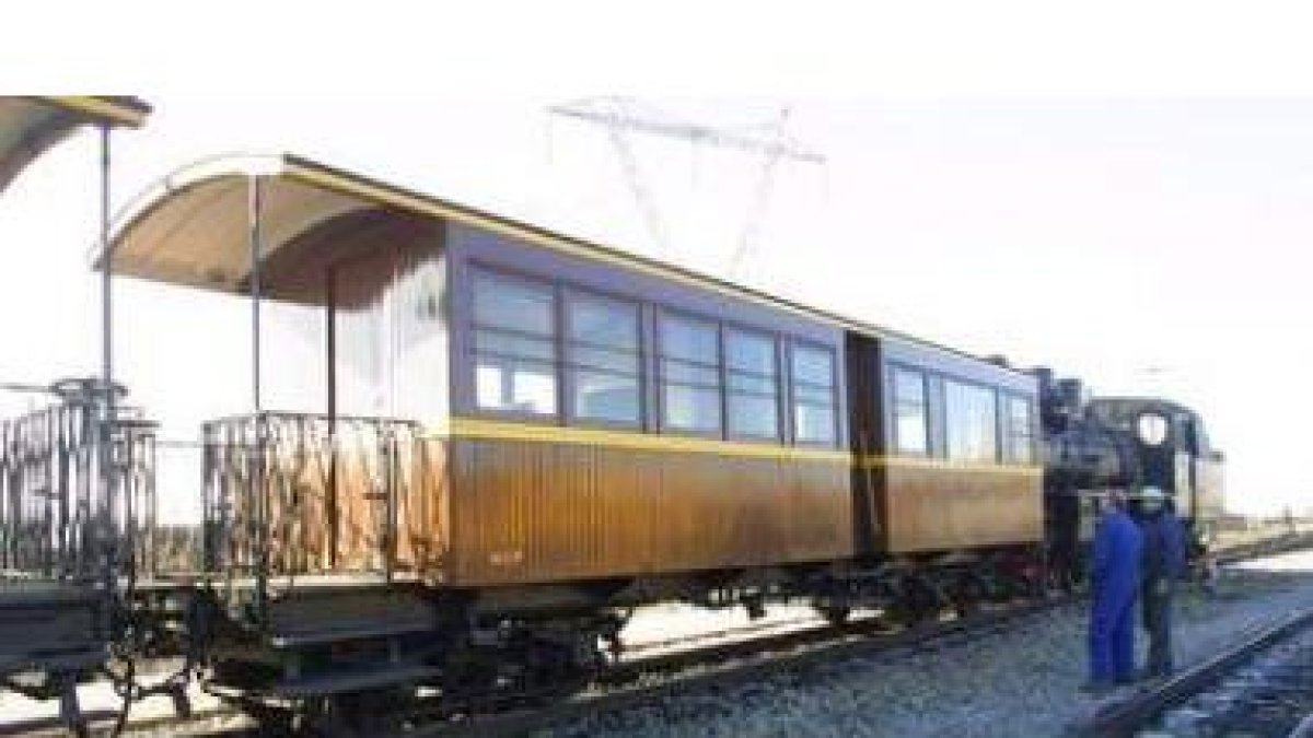 Los viejos vagones del tren de pasajeros de la MSP, tirados por una locomotora de vapor con motivo d