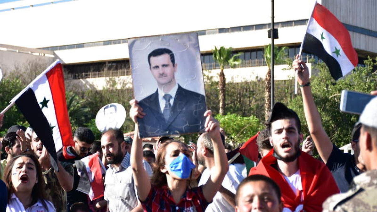 Siria está fracturada entre partidarios y detractores. BADAWI