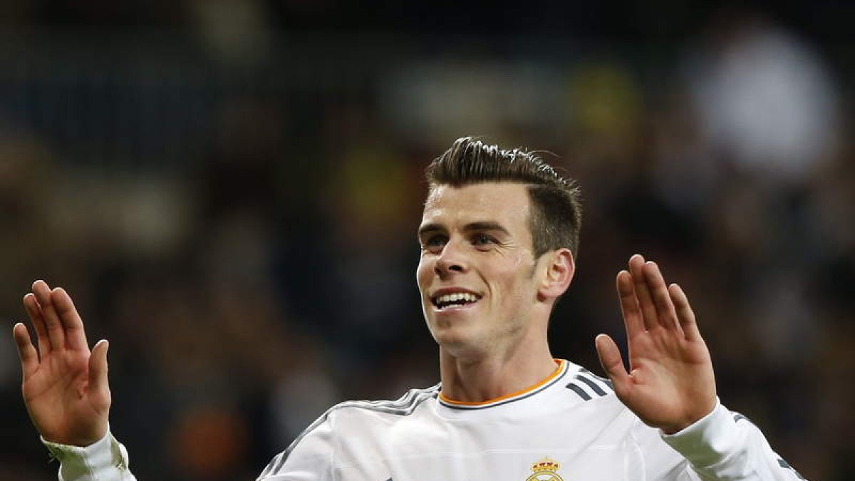 Bale celebra uno de sus tres goles ante el Valladolid.