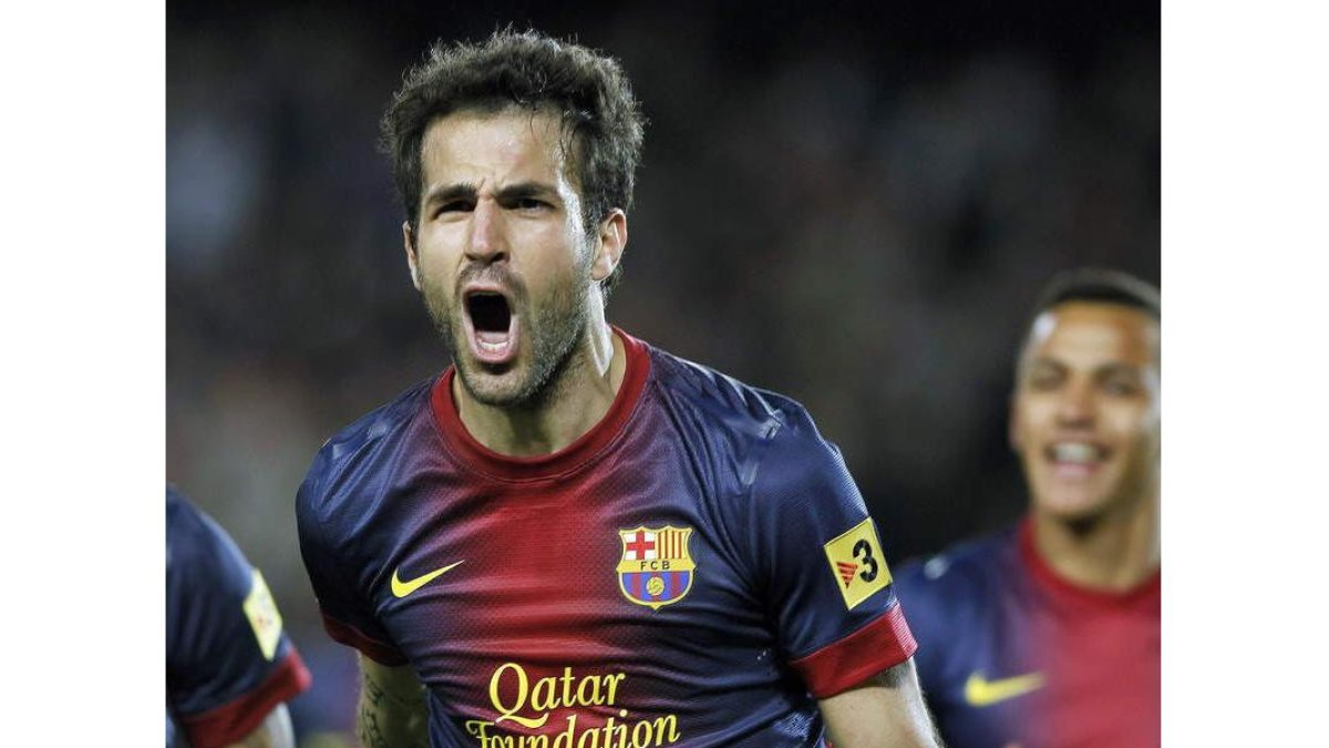 Cesc celebra uno de sus goles con el Barça.