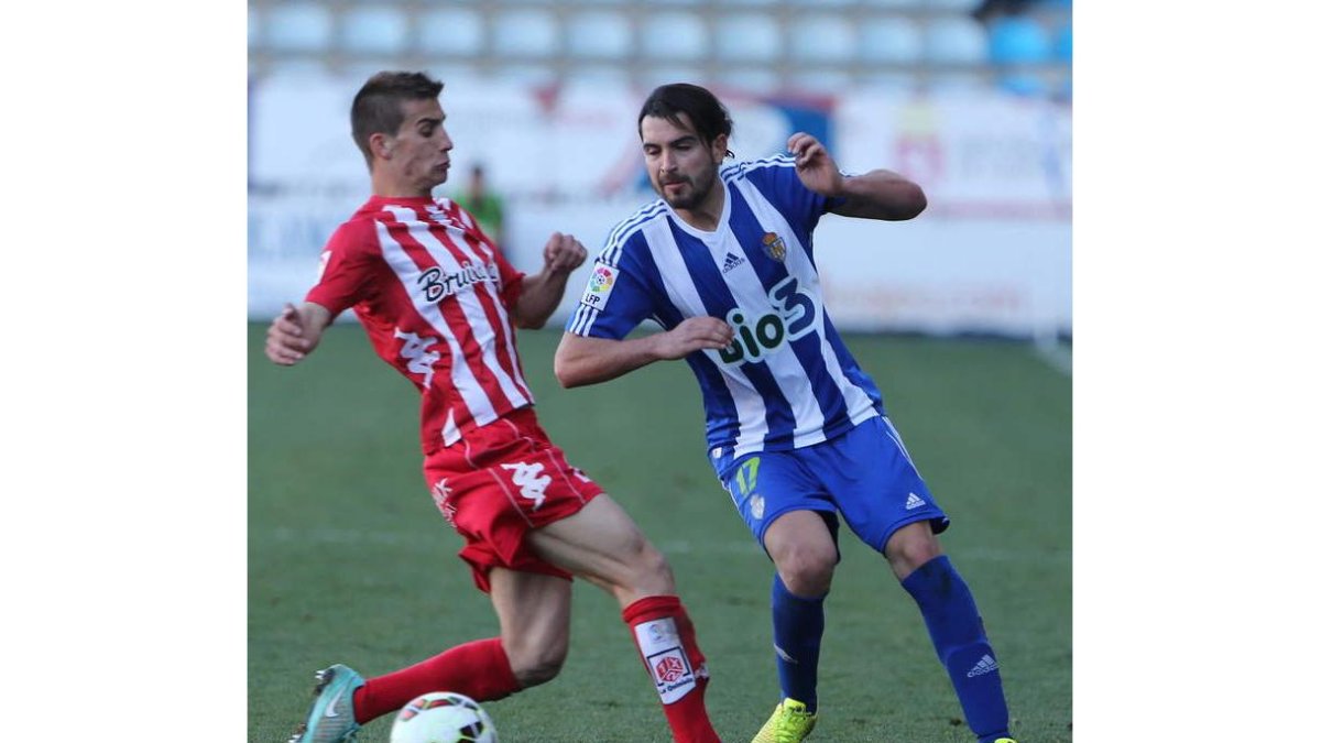 Andy, a la derecha, en un lance ante el Girona FC.