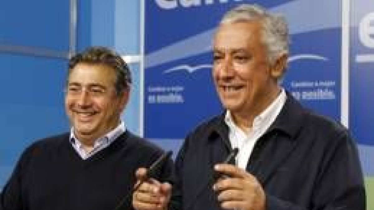 El secretario general del PP andaluz Juan Ignacio Zoido y Javier Arenas