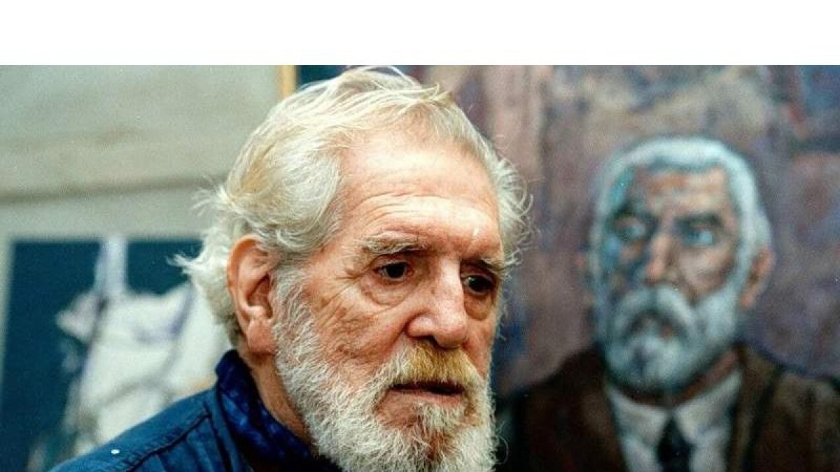 El artista José Vela Zanetti ante un retrato de Gaudí. FEDERICO VÉLEZ