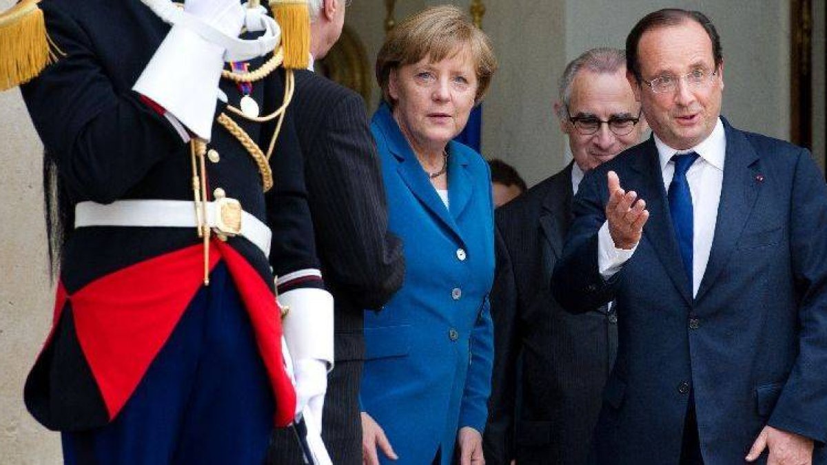 El presidente francés, François Hollande, junto a la canciller alemana, Angela Merkel.