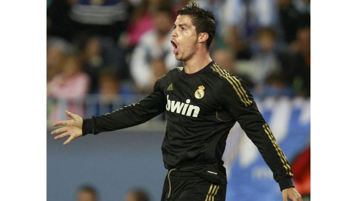 Cristiano Ronaldo celebra uno de sus goles ante el Málaga.