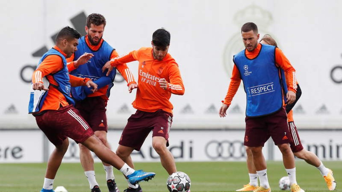 La plantilla del Madrid, ya con Hazard a pleno rendimiento, prepara el duelo ante el Chelsea. EFE