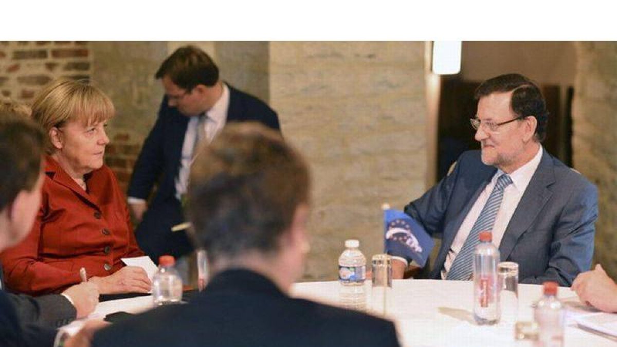 Mariano Rajoy, durante una reunión con Angela Merkel, el jueves en Bruselas.