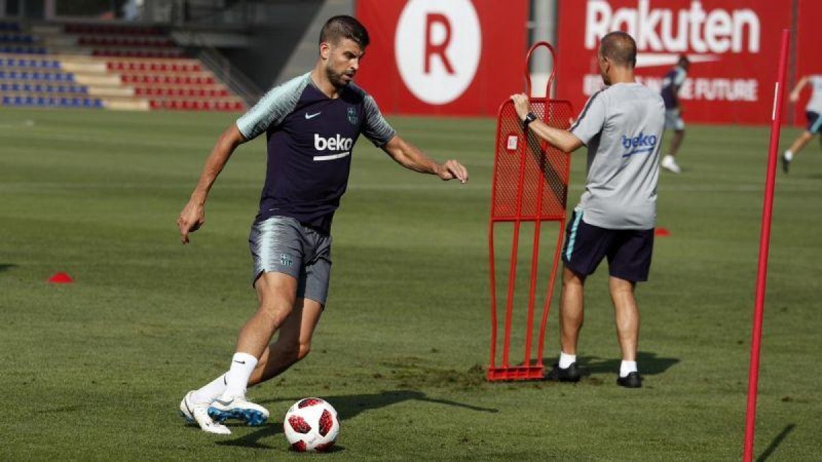 Piqué, en un entrenamiento del Barça de este pretemporada.