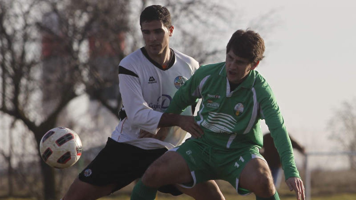 Alfonso, a la derecha, regresa al equipo virginiano.