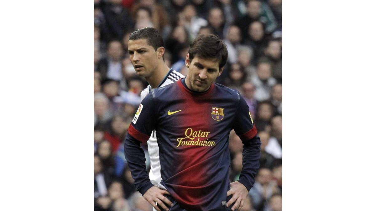 Messi, junto a Cristiano Ronaldo, en el último clásico disputado.