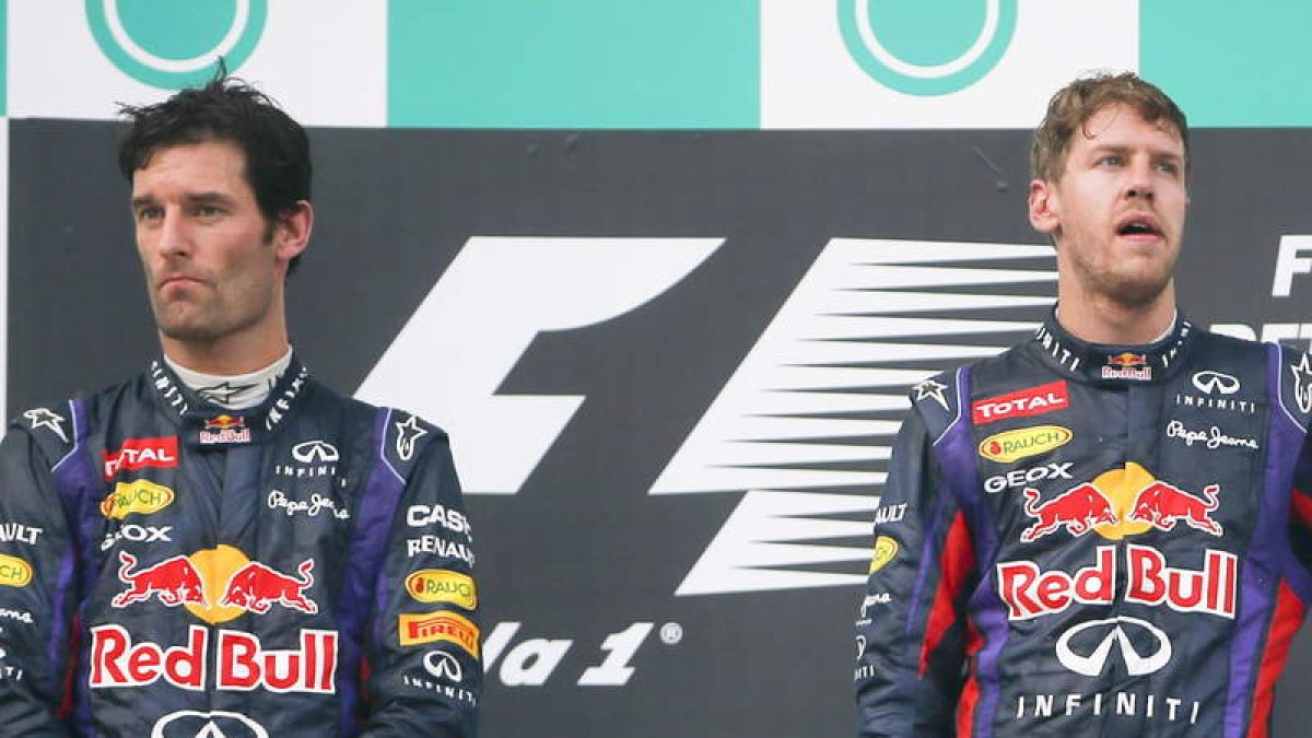 Webber y Vettel, tensos y distantes en el podio de Sepang.