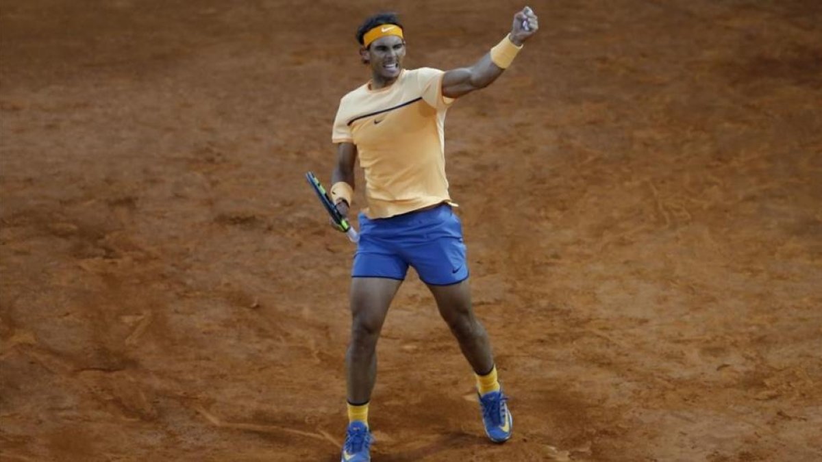 Nadal celebra con rabia su victoria frente al estadounidense Querrey, que lo sitúa en cuartos