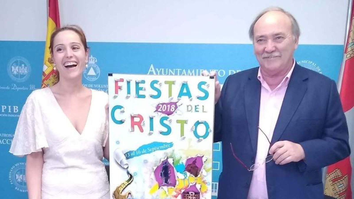 Laura Álvarez y José Manuel Otero, ayer con el cartel. CEBRONES