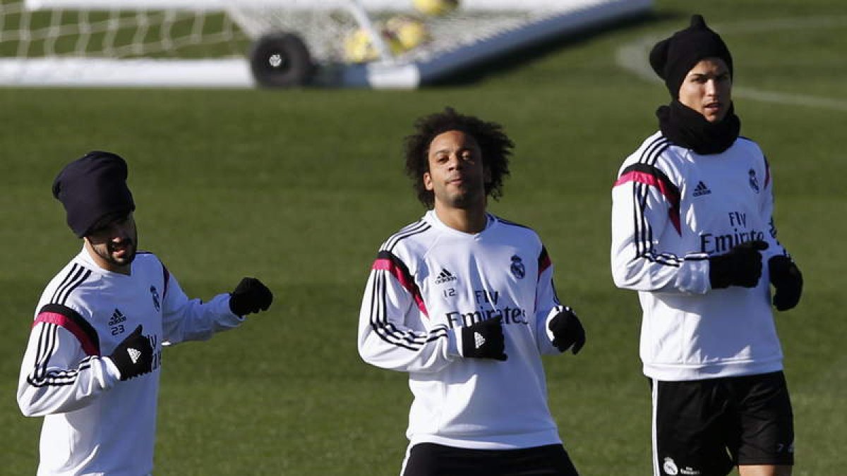 Isco, Marcelo y Cristiano Ronaldo, durante el entrenamiento de ayer en Valdebebas.