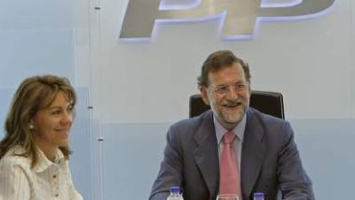 María Dolores de Cospedal junto a Mariano Rajoy.