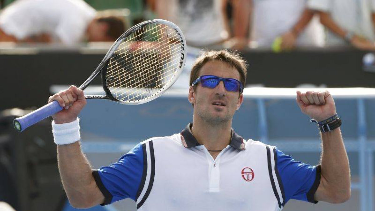 Tommy Robredo celebra su victoria sobre Benneteau.