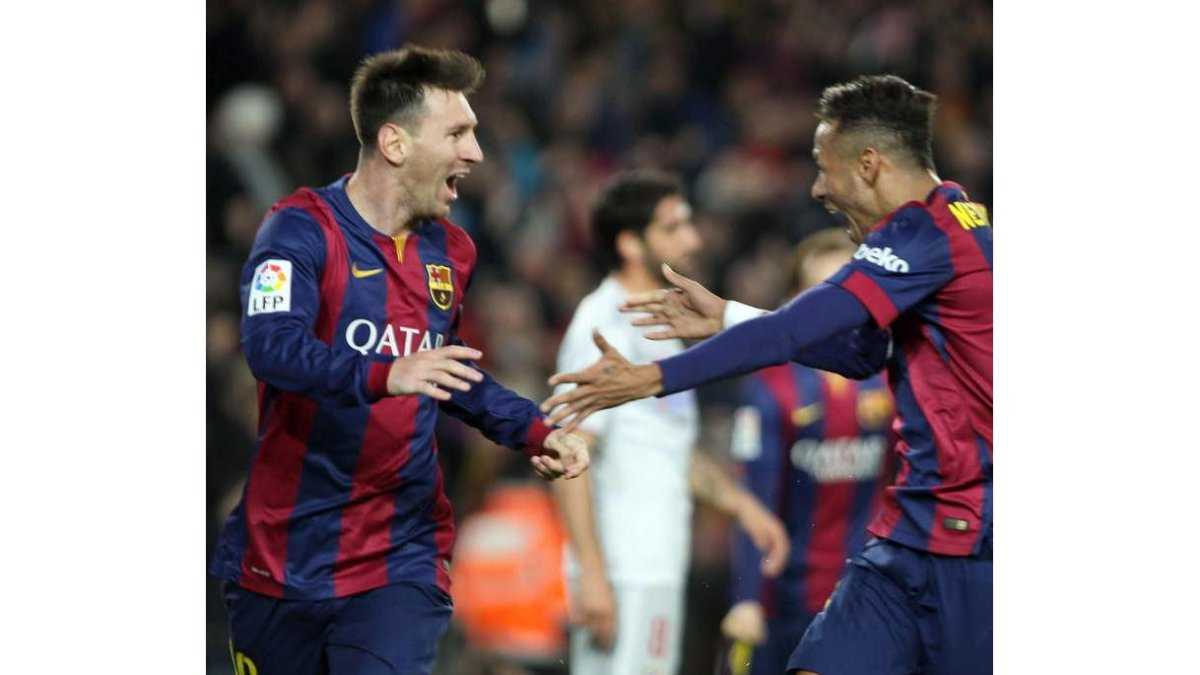 Messi celebra con Neymar el tercer gol del Barcelona frente al Atlético.