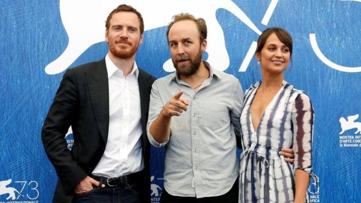 Michael Fassbender, Derek Cianfrance y Alicia Vikander, en Venecia.
