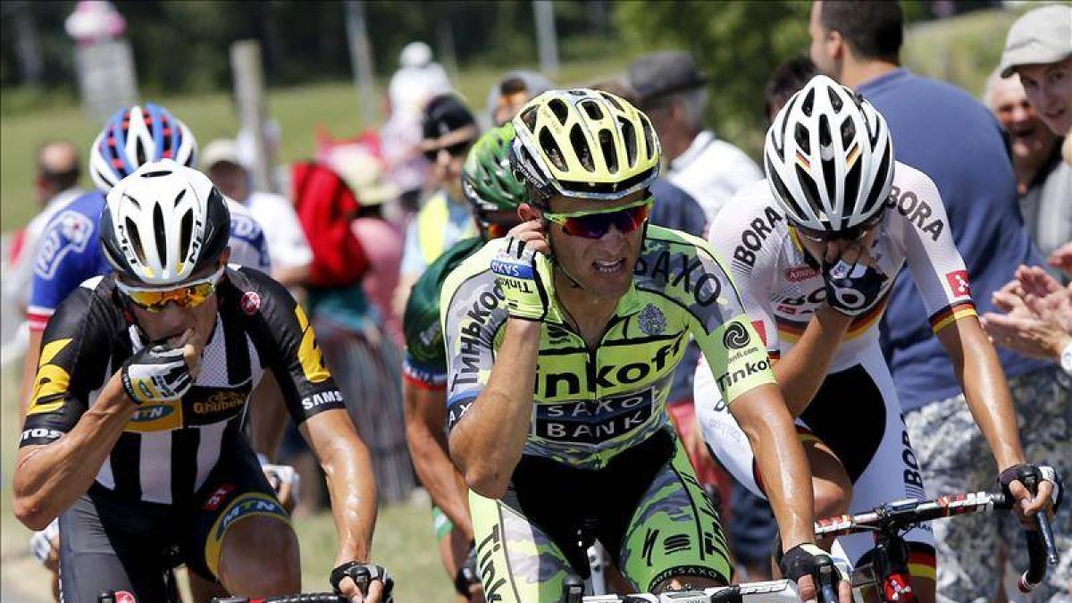 El belga Serge Pauwels, del equipo MTN Qhubeka, el polaco Rafal Majka, del equipo Tinkoff Saxo, y el alemán Emanuel Buchmann, del equipo Bora Argon 18.