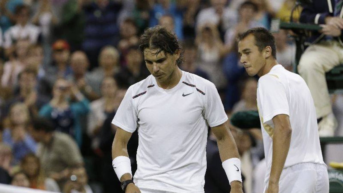 Rosol y Nadal, al final del partido.