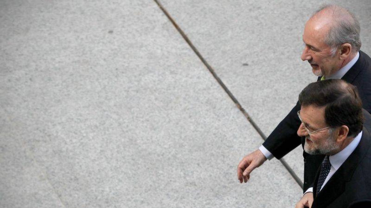 Mariano Rajoy y Rodrigo Rato en un acto de Bankia celebrado en el 2012.
