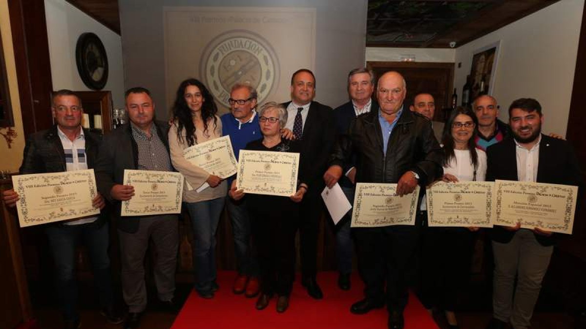 Foto de los ganadores de la octava edición del concurso de restauración organizado por Prada. L. DE LA MATA