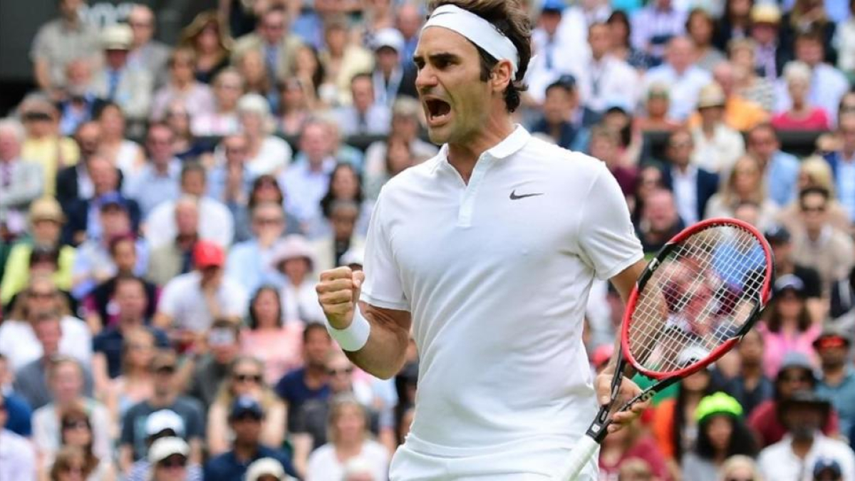 Roger Federer celebra un punto ante Steve Johnson.
