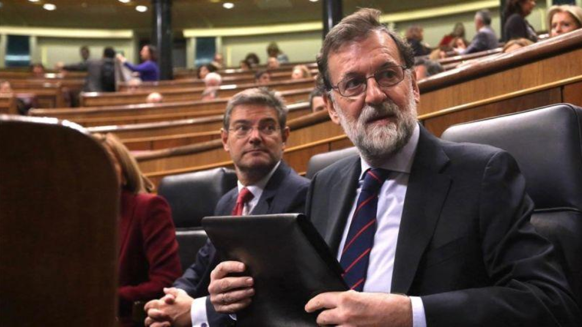 Mariano Rajoy, junto a Rafael Catalá, en el Congreso.