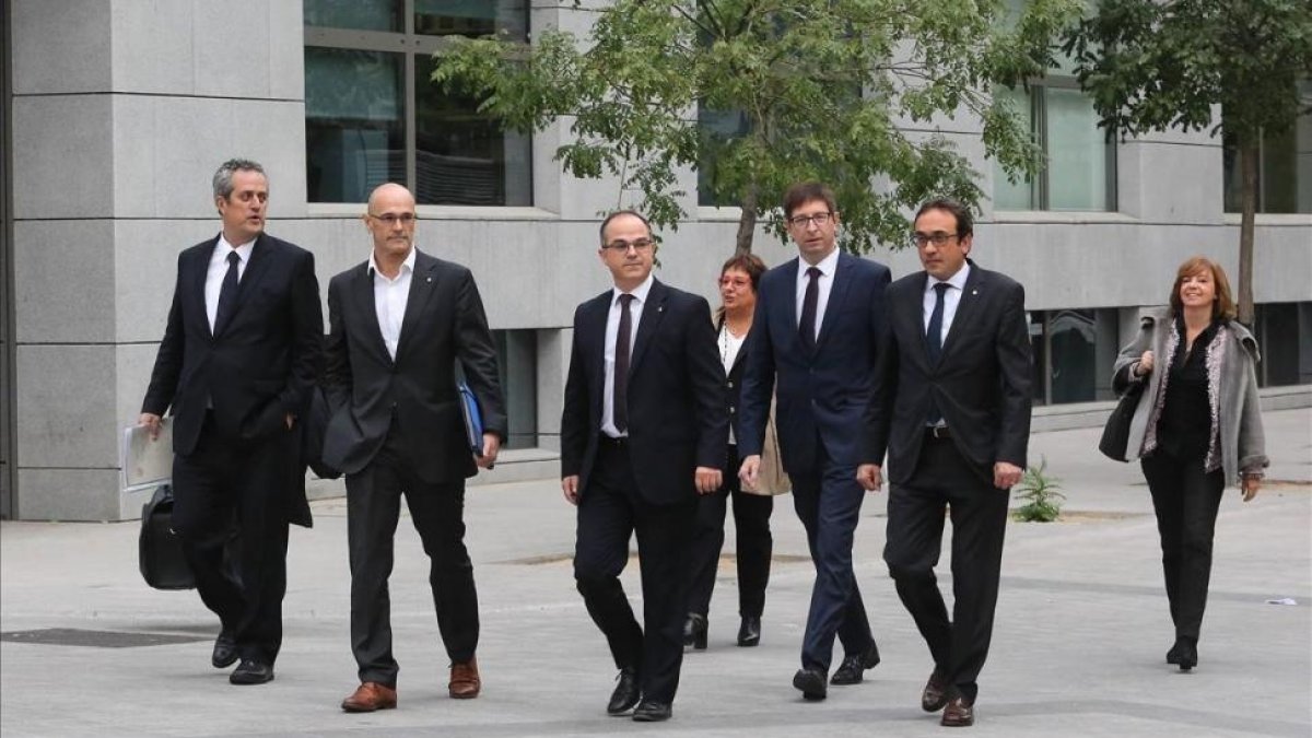 Los exconselleres, a su llegada a la Audiencia Nacional para declarar ante la jueza Carmen Lamela. /