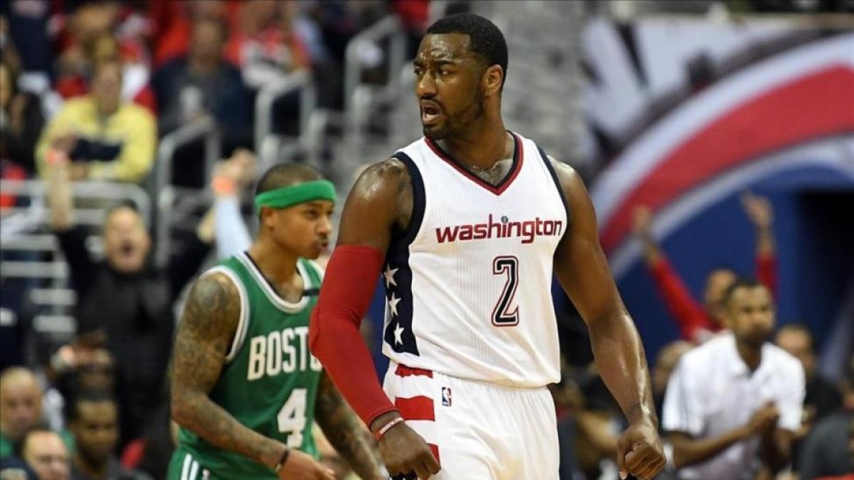 John Wall (Washington) celebra una canasta en el tercer cuarto.