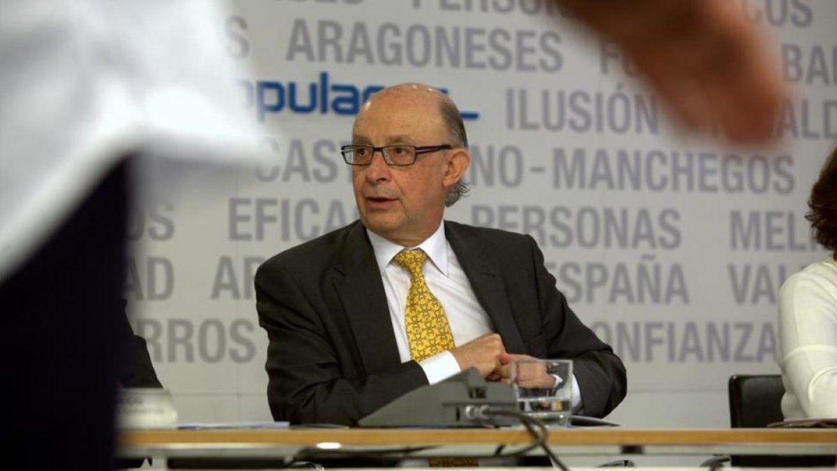 El ministro de Hacienda, Cristóbal Montoro, en la sede del PP este lunes.