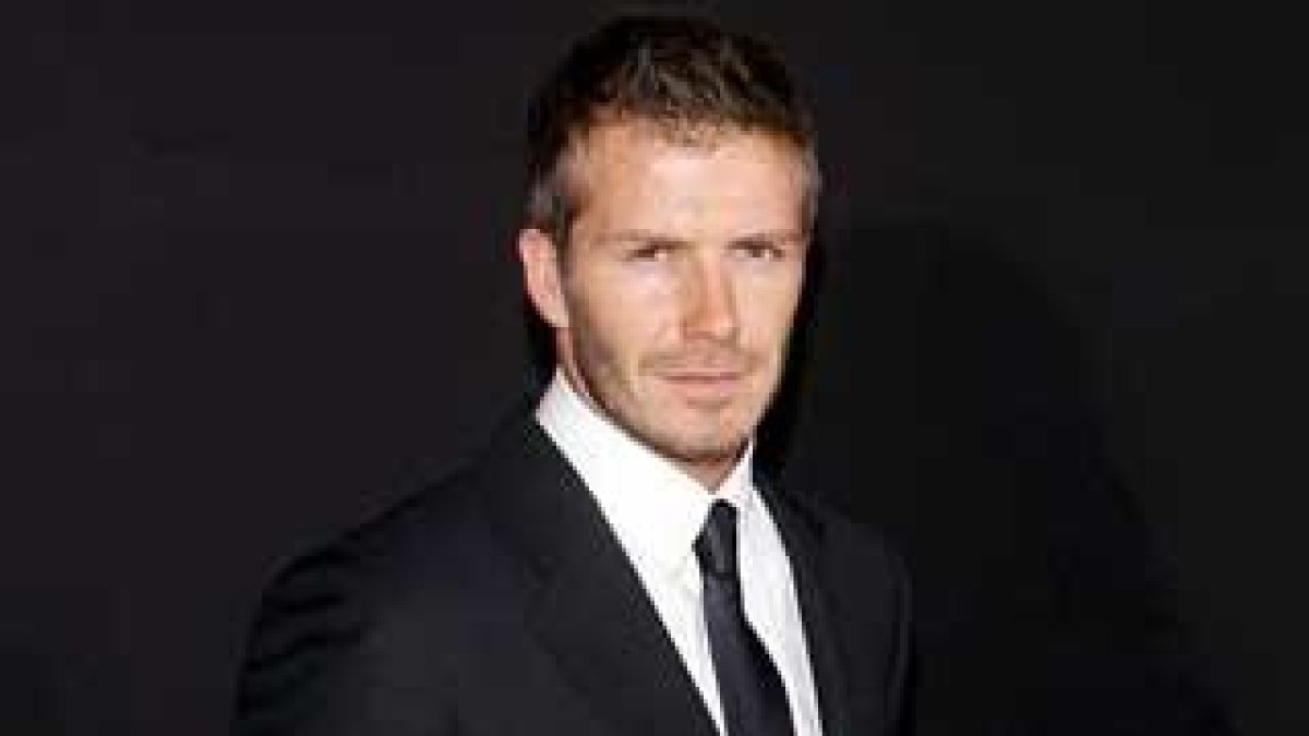 David Beckham posa durante el desfile de Emporio Armani.