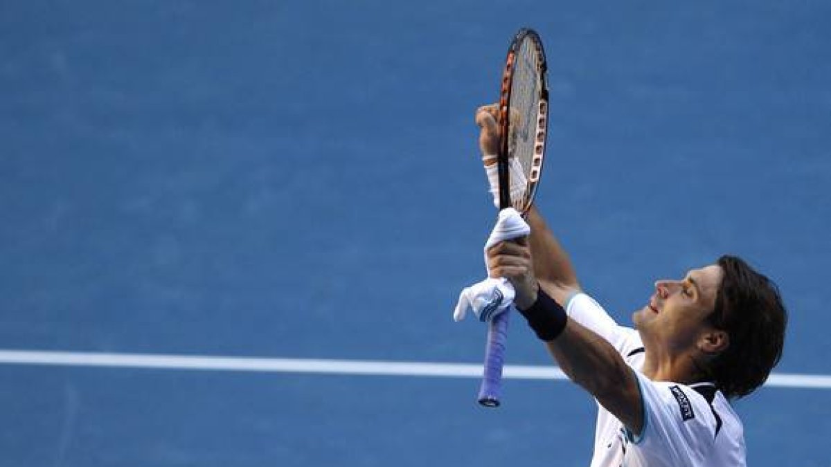 David Ferrer celebra su victoria ante el francés Richard Gasquet, este lunes, en Melbourne.