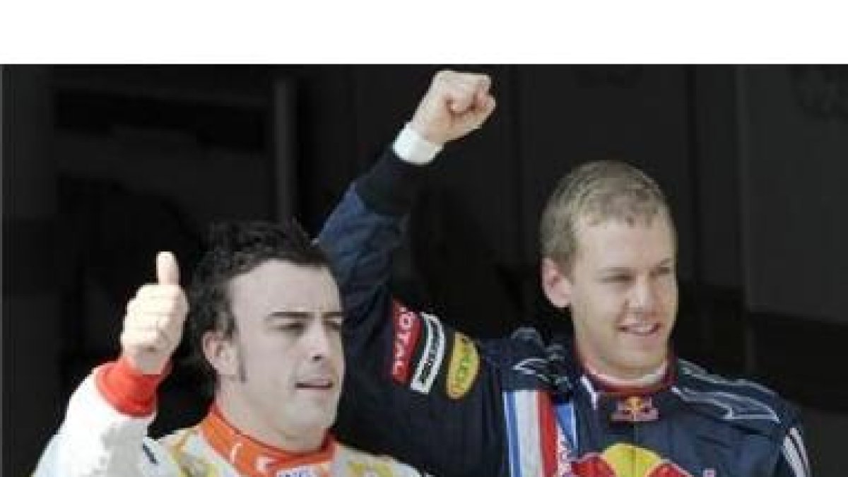 Vettel y Alonso, felices tras la clasificación.