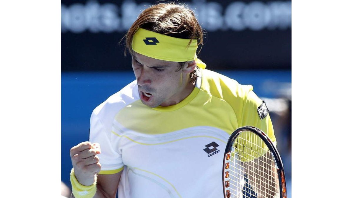 Ferrer celebra su golpe ganador en el quinto set ante Almagro.
