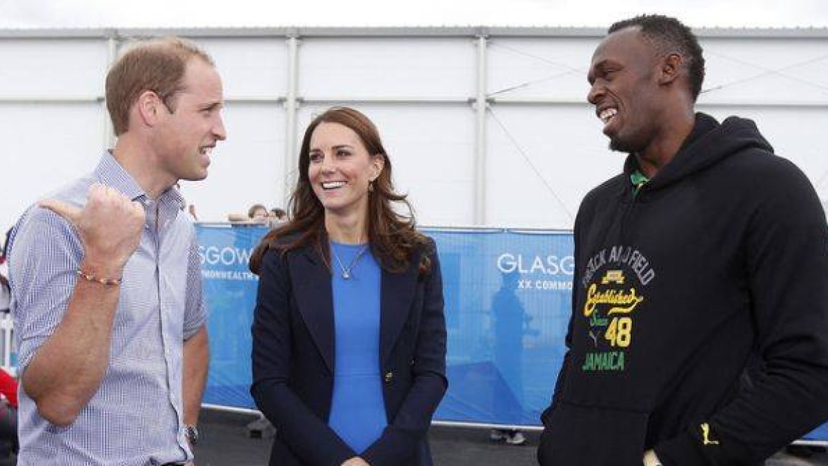 Usain Bolt, con los príncipes Guillermo y Catalina, en un acto en Glasgow.