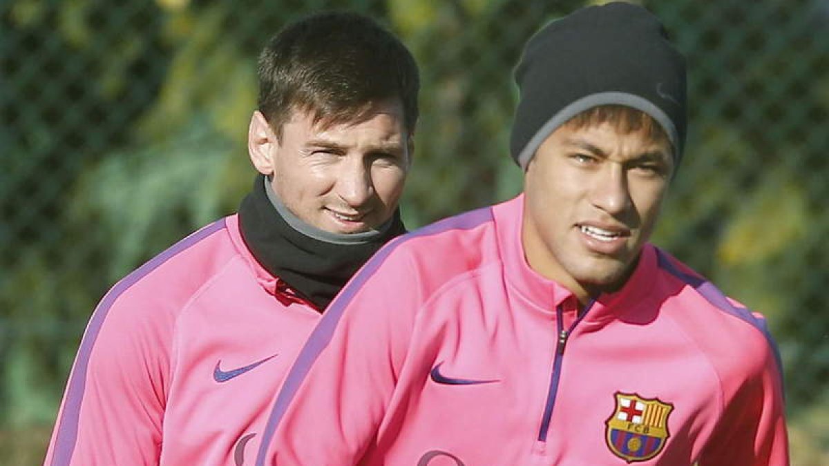 Los barcelonistas Messi y Neymar durante el entrenamiento del Barcelona.
