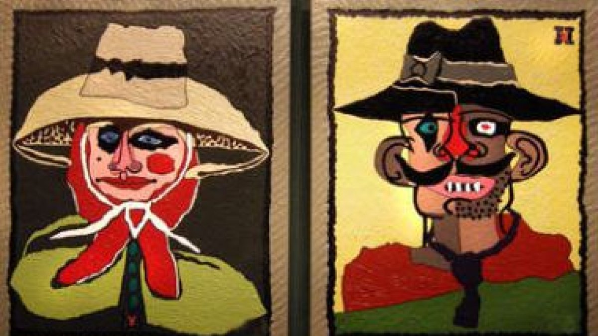 Dos de los sugerentes retratos que Vicente Muñoz Renedo muestra en el Varsovia.