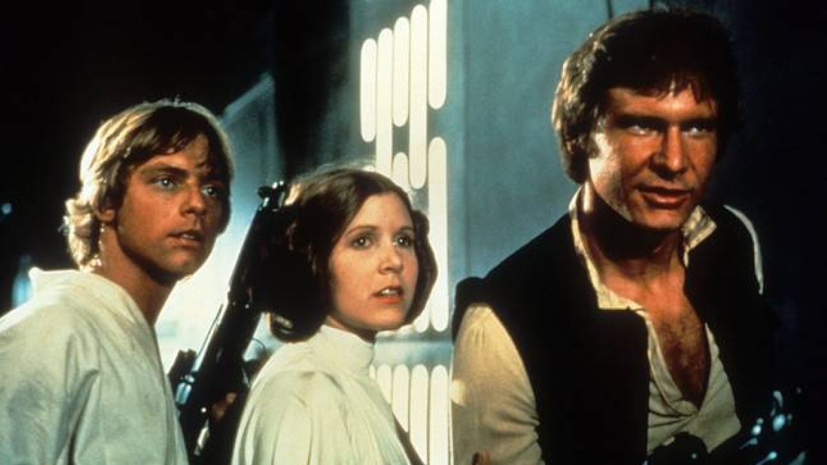 Han Solo (Harrison Ford) junto a los personajes de Leia y Luke Skywalwer, en la primera trilogía de 'La guerra de las galaxias'.