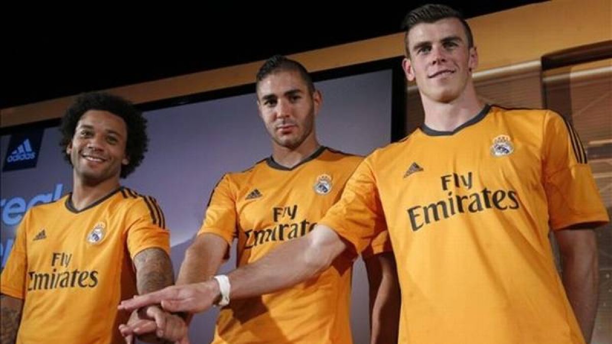 Marcelo, Benzema y Bale (de izquierda a derecha) en la presentación del tercer uniforme del Real Madrid.