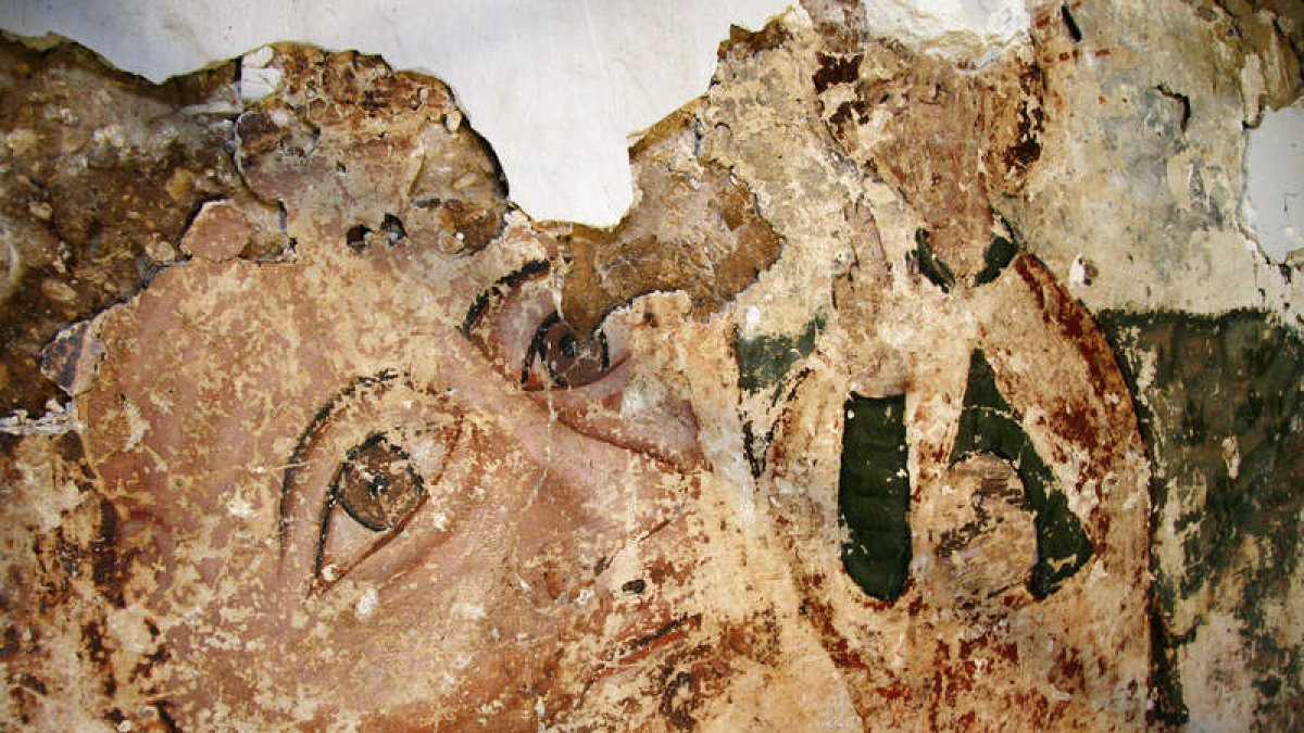 El rostro de San Cristóbal en una vista parcial de estas pinturas que probablemente daten del siglo XV. F. OTERO PERANDONES