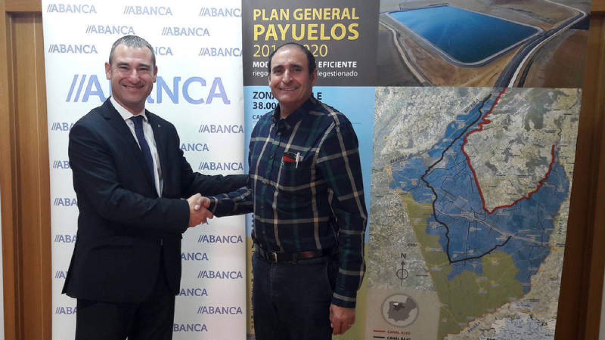 Marcos Álvarez y Jorge Fernando Álvarez, tras firmar el acuerdo. DL