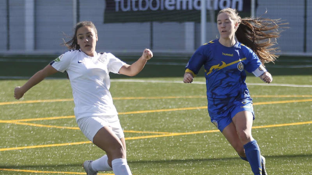 Las jugadoras leonesas sufrieron un excesivo castigo frente a las alcarreñas. FERNANDO OTERO