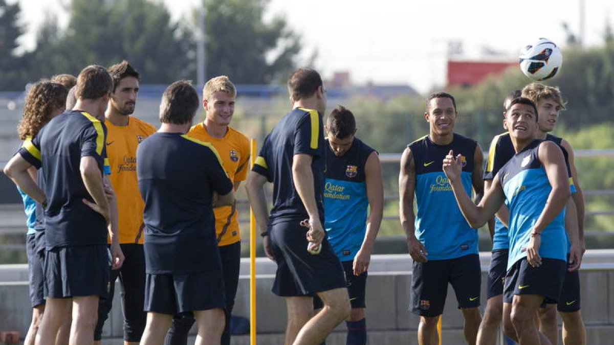 Los jugadores del Barça en un entrenamiento.