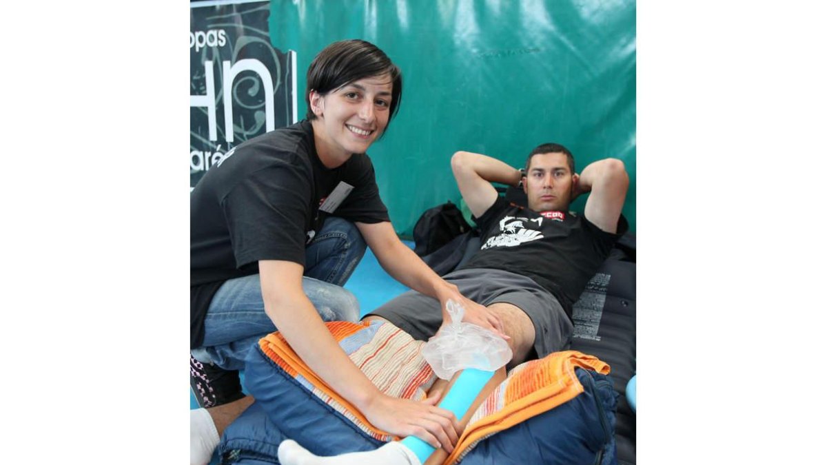 Sara Fuentes con Marcos Flecha, que tuvo que acudir al fisioterapeuta.