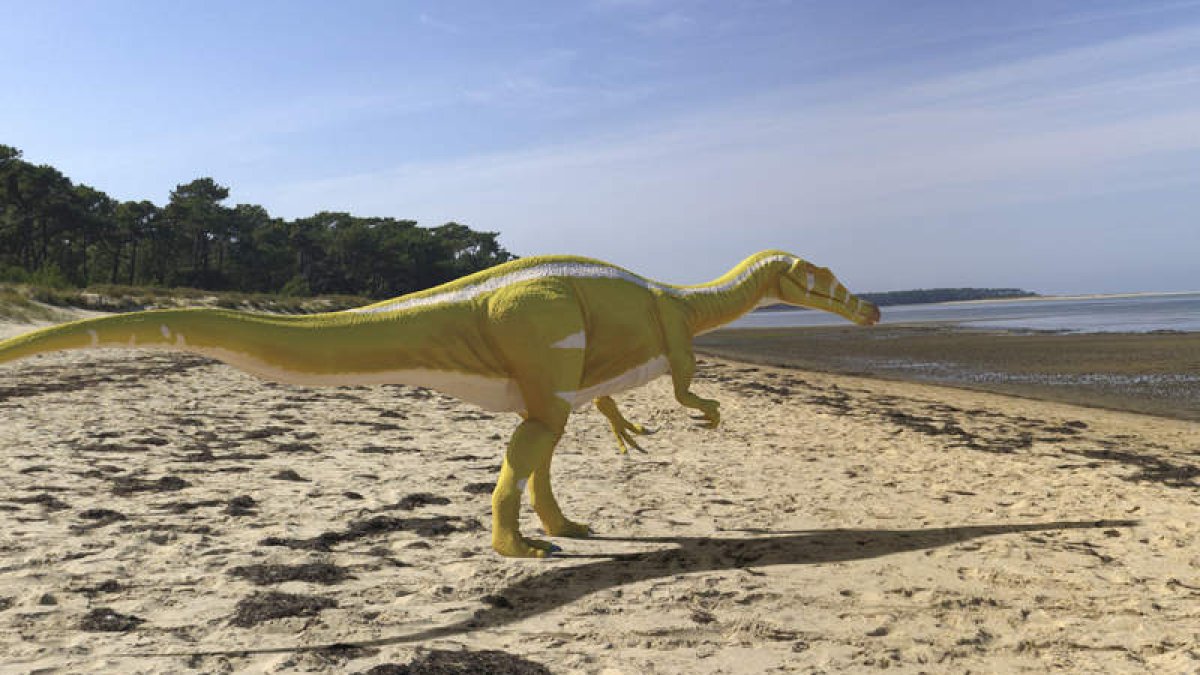 Recreación artística de un ejemplar de una nueva especie de dinosaurio, un espinosaurio bípedo y carnívoro. EFE
