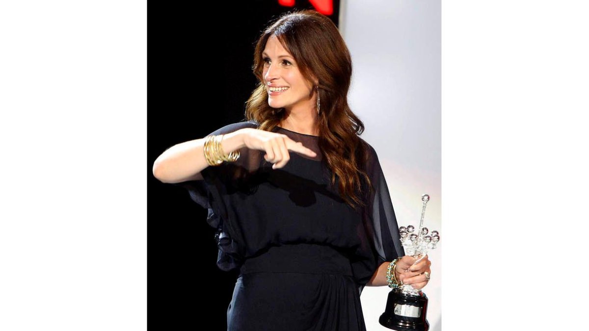 A la izquierda, la actriz Julia Roberts; a la derecha, el futbolista Messi.
