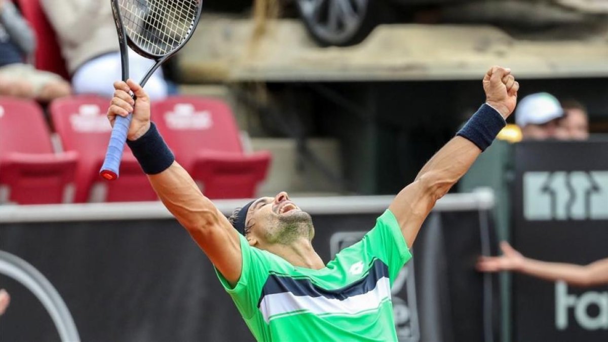 David Ferrer celebra su triunfo ante Dolgopolov en la final de Bastad.