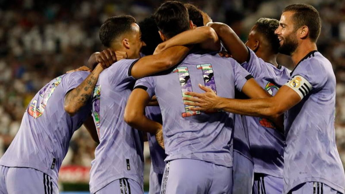 El Real Madrid celebra el segundo gol a la Juventus que anotó Marco Asensio. ETIENNE LAURENT